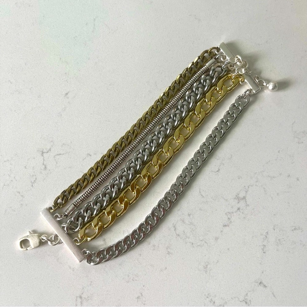 Jenny Bird 5 chain silver and gold bracelet. NWOT